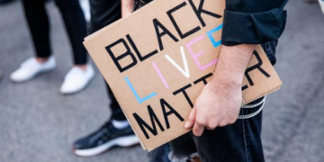 Black Americans support the Floyd protests. Whites are divided. Here’s why.